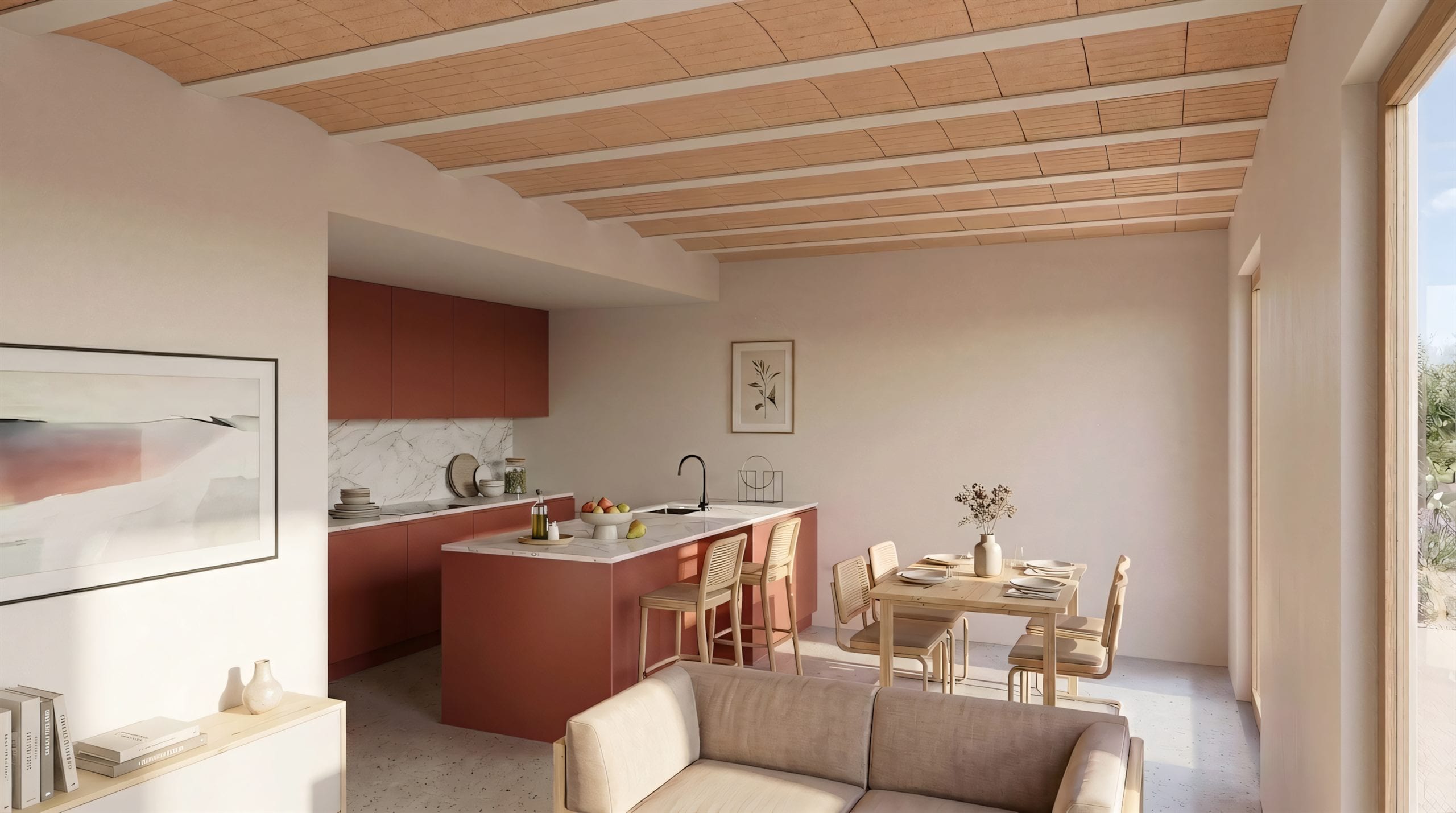 Estar-menjador-cuina en planta baixa sota volta catalana de maó de pla, cuina lacada en color teula amb taulell de marbre, paviment continu i corredora al jardí.
